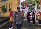 Bhabinkamtibmas Pejanggik Amankan Jalan Sehat SMPN 16 Mataram Peringati Hari Guru 2025